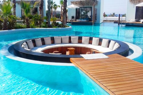 Posedenie v Stella Island Luxury Resort & Spa