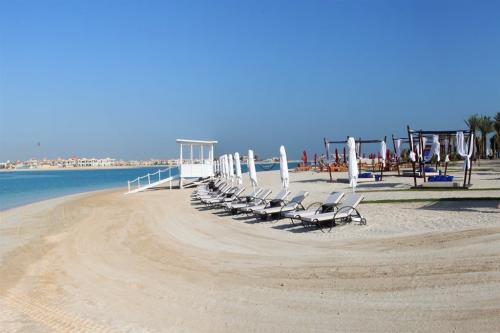 Pláž pred hotelom Rixos The Palm Dubai